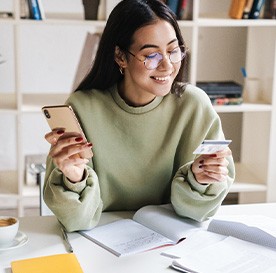 Woman using a credit card