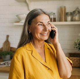 Woman smiling on the phone