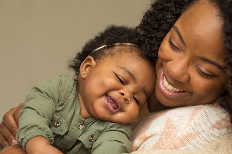 Mother smiling with her child